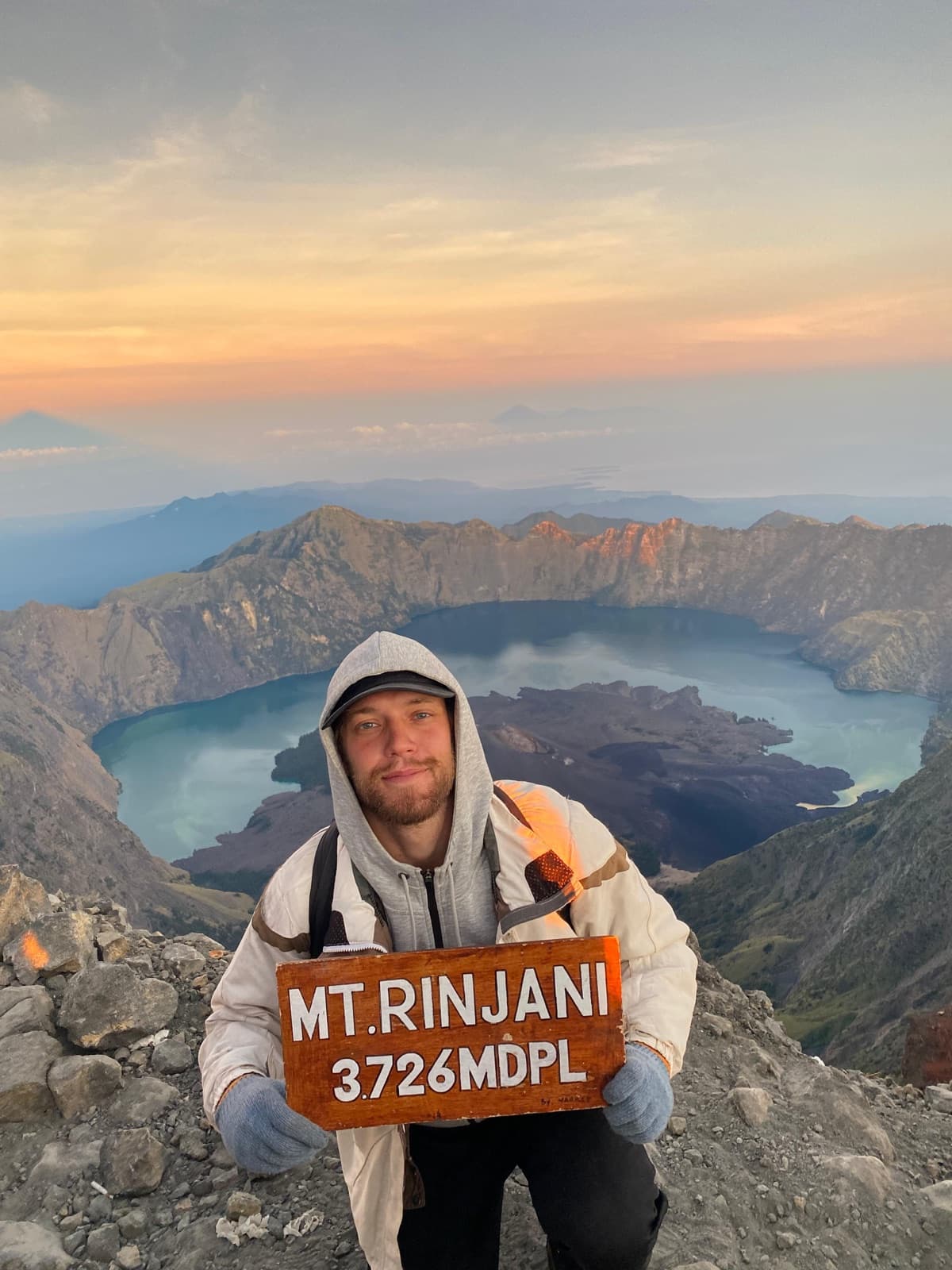 Daniel on the summit of Mount Rinjani at sunrise